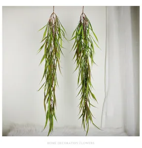 Artificial hanging plant detail view, showing realistic green leaves and natural cascading vines.