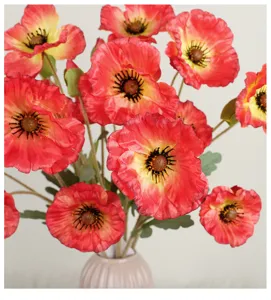 Close-up detail of artificial red poppy flowers with long stems, perfect for home floral decor.