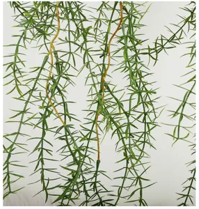 Artificial hanging fern plant vine green leaf wall decor detail close-up for home decoration