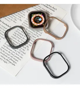 Detailed close-up view of metallic watch bumper protective case accessories on stylish props.