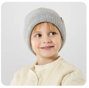 Bébé bonnet en tricot épais doublé polaire, bonnet d'hiver chaud et doux pour nourrissons 0-3 ans.