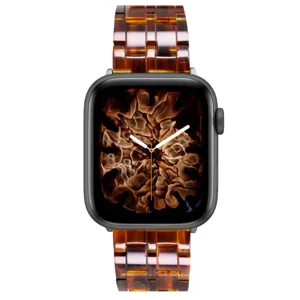 Resin watch band compatible with Apple Watch, stylish tortoise shell strap for women.