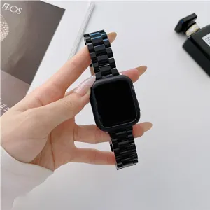 Black ceramic link watch band and protective case detail view, premium glossy finish accessory.