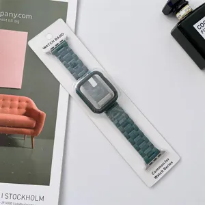 Detail shot of dark green link watch band and protective case for smart watch accessory.