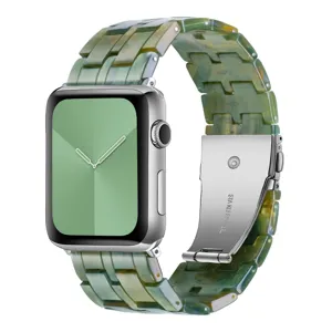 Green resin watch strap detail view, elegant marble pattern with stainless steel folding buckle.