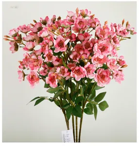 Magnifique bouquet de fleurs artificielles roses pour décoration intérieure et mariage.
