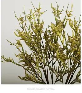 Detailed view of artificial lover's grass branch foliage, perfect for floral arrangement.
