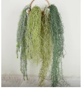 Artificial hanging air plant vine bundle for wall decor, detailed view of green foliage.