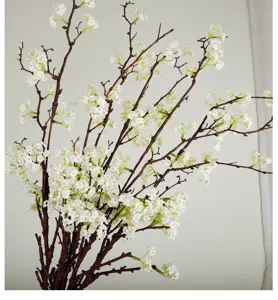 Ramo di salice delle nevi artificiale con piccoli fiori bianchi per arredamento