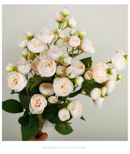 Artificial tea rose flower bunch detail close up shot, elegant home decoration floral prop.