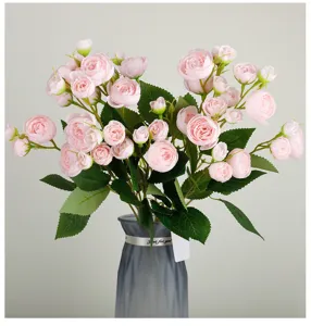Artificial pink rose bouquet with glass vase, perfect for home decor and party styling.