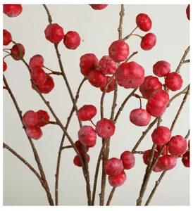 Artificial pumpkin berry branch detail, red foam fruit decor for home and holiday arrangement.