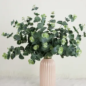Artificial eucalyptus leaves bouquet faux greenery plant for home interior decoration.