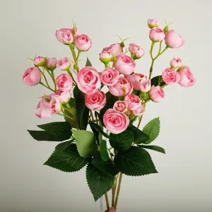 Artificial pink tea rose bouquet with green leaves, perfect for home decor and wedding decor.