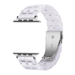 White resin watch strap replacement for Apple Watch stainless steel clasp detail view.