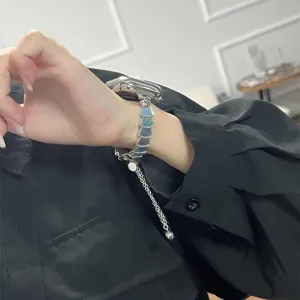 Bracelet de montre en métal d'acier et coquillage naturel compatible Apple Watch.