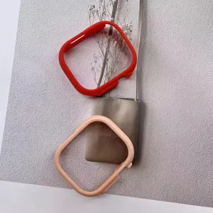 Detailed view of silicone protective cases compatible with Apple Watch Ultra 49mm in red and pink.