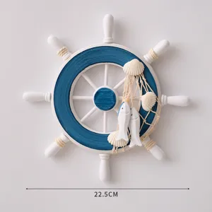 Mediterranean wooden ship wheel wall decor with shells and fish, blue and white, 22.5cm
