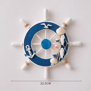 Mediterranean wooden ship wheel wall hanging detail view, nautical decoration craft ornament.