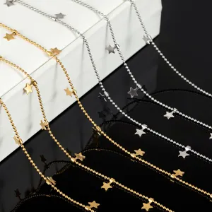 Close-up detail of stainless steel bead chain with cute star charms for DIY jewelry making.