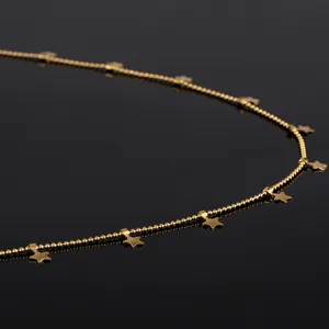 Gold stainless steel beaded chain with star charms for DIY jewelry making and necklace detail.