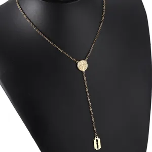 Gold stainless steel Y-shaped necklace with circular medallion and razor blade pendant.