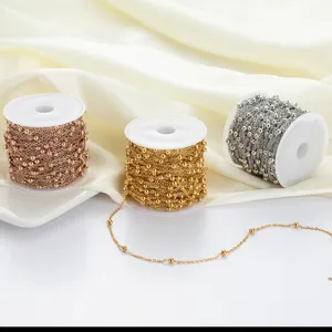 Detail shot of DIY stainless steel beaded chains in gold, silver, and rose gold on spools.