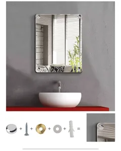 Detalle de instalación de espejo de pared con tapas decorativas, arandelas y tornillos.