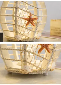 Mediterrane stijl LED nachtlamp detail met touwnet, prachtige zeester en schelp ornamenten.