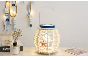 Mediterrane LED nachtlamp lantaarn met touw en zeester voor slaapkamer inrichting.