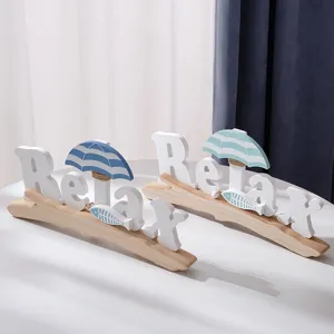 Mediterranean wooden Relax sign table decor with beach umbrella and fish for home room.