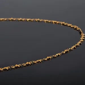 Gold stainless steel dolphin chain link detail, perfect for DIY necklaces and bracelets.