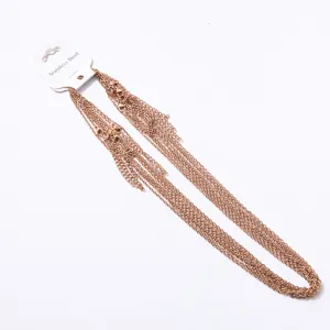 Detailed view of multi-strand rose gold stainless steel chain necklace, exquisite texture.