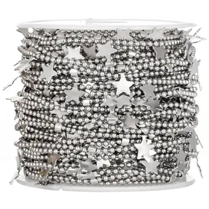 Close-up detail of stainless steel bead chain with star charms for DIY jewelry making.