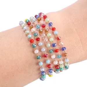 Multi-strand colorful crystal glass bead bracelet for women, elegant wrist jewelry accessory.