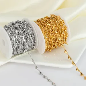 Detail shot of stainless steel heart chain spool, perfect for DIY jewelry and crafts.