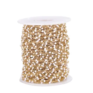Gold stainless steel chain with white enamel beads, perfect for DIY jewelry making.
