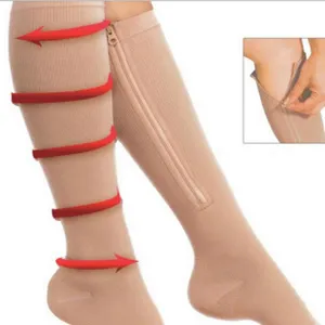Detail view showing zipper compression socks with pressure indicator arrows for support.