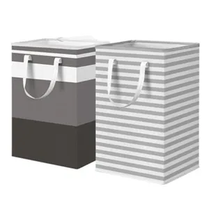 Panier à linge en tissu à rayures grises et blanches, corbeille de rangement résistante.