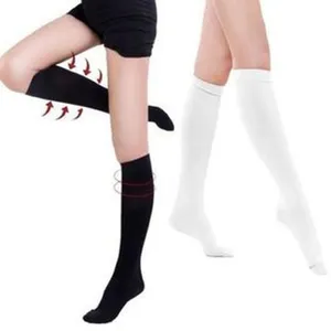Detailed view of thermal compression knee-high socks showing leg pressure design features.