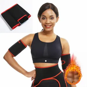 Detailaufnahme des schwarz-roten Fitness-Schwitzgurt-Sets mit Arm-, Taillen- und Oberschenkelgurten.