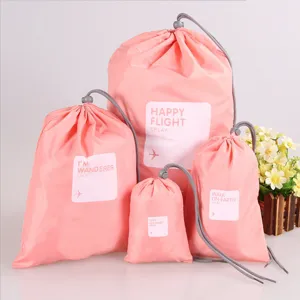 Rosa 4-teiliges Kordelzug Reise Aufbewahrungsbeutel Set für Kleidung und Kleinigkeiten.