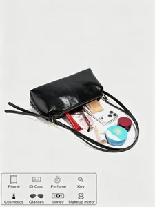 Vue détaillée du sac porté épaule en cuir PU noir montrant l'intérieur spacieux et pratique.