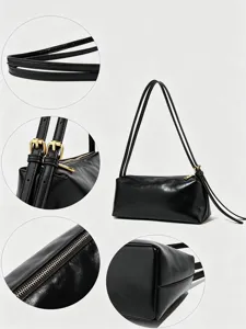 Sac epaule noir detail sangle et fermeture eclair minimaliste mode quotidienne