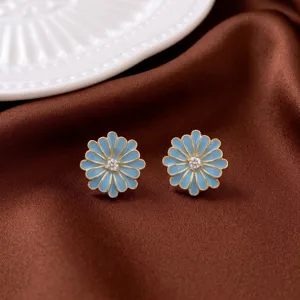 Pendientes de botón de flor azul claro para mujer, elegantes joyas de circonita dorada.