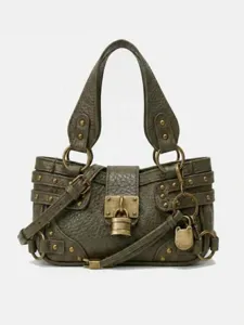 Sac bandoulière moto motif litchi rétro avec serrure métallique et sangle réglable pour femmes.
