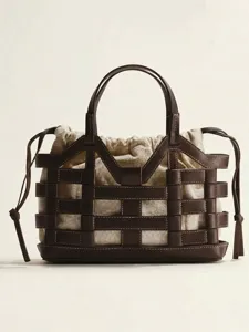 Bruine leren kofferbaktas met beige canvas binnenpouch, stijlvolle retro schoudertas voor dames.