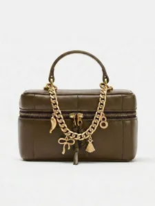 Green leather box bag with chunky gold chain and cute charms, stylish top handle design.