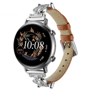 Luxe lederen smartwatch band met diamant hoefijzer gesp, elegante bruine rindsleder details.