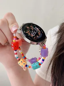 Gedetailleerde close-up van kleurrijke monster kraal horlogeband voor Huawei smartwatch.